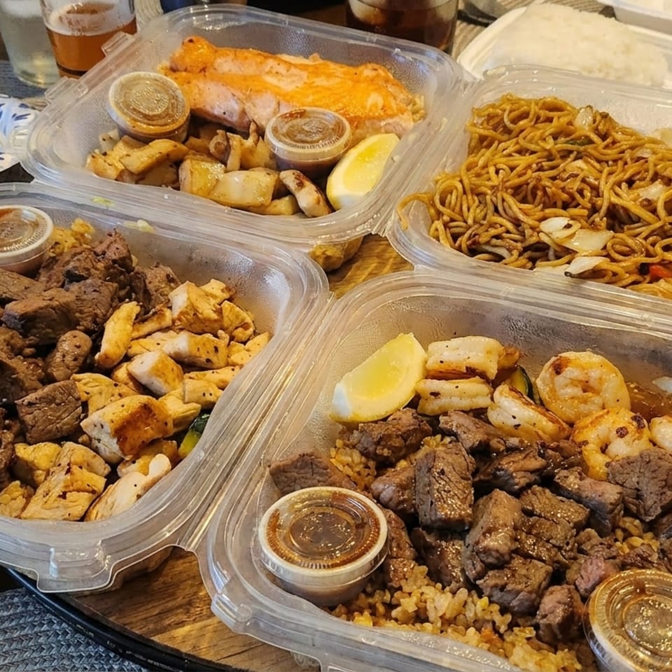 Four takeout containers filled with various hibachi meals, including steak, chicken, shrimp, salmon, and noodles.